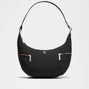 Lululemon Black Sling Bag with Gold Metal Hardware 6L